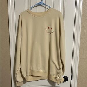 Cream Sweatshirt with Smiley Face
